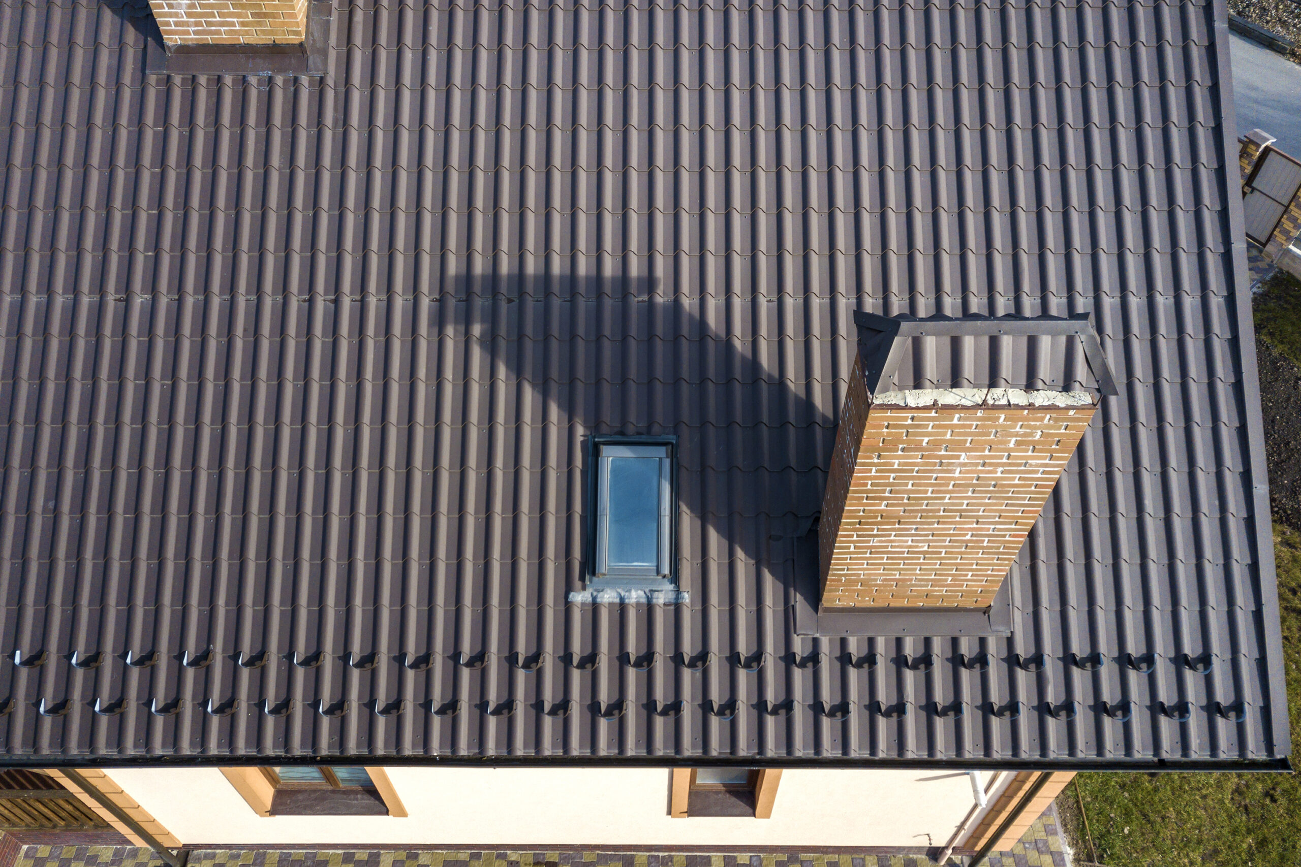 aerial top view of building steep shingle roof br 2024 12 06 03 55 24 utc scaled